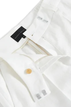 Lniane spodnie off white z wąską nogawką